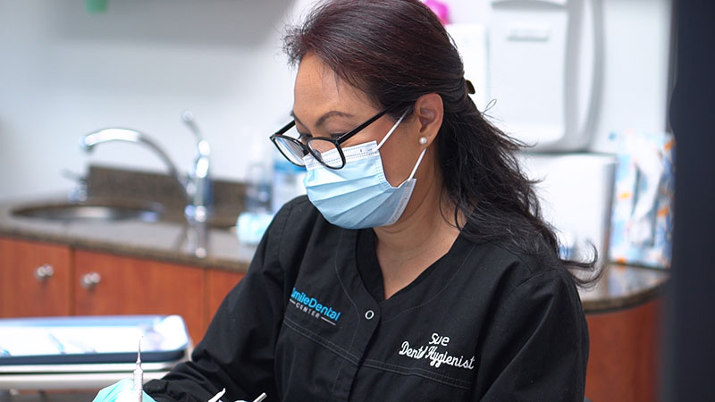 Dental Hygienist with Patient