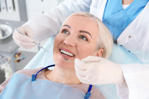 Dentist Examining Patient